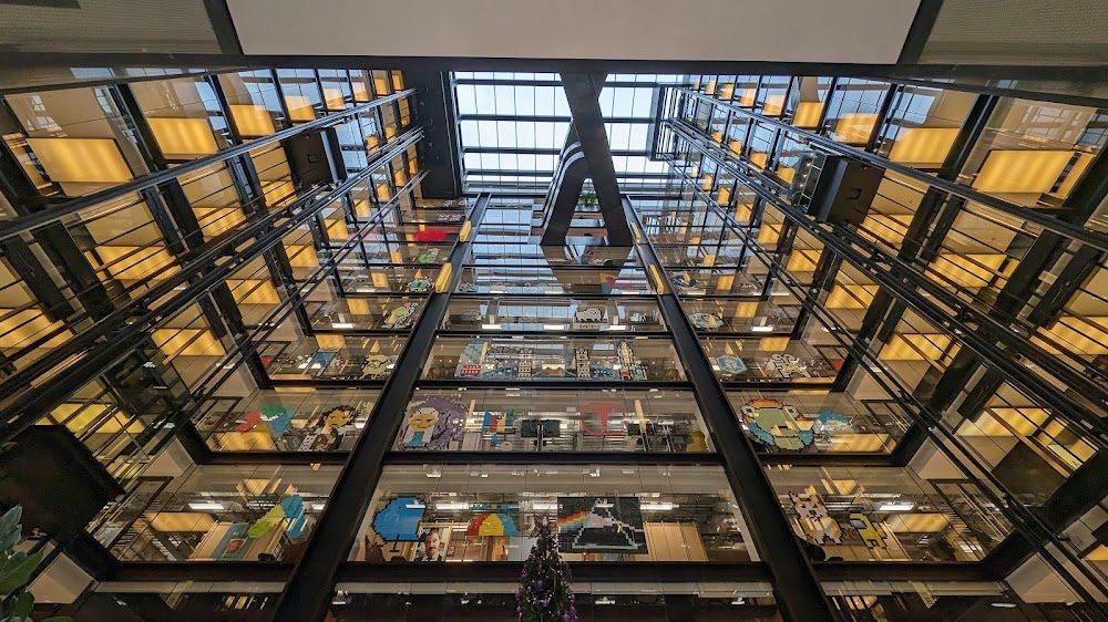 Inside Google's London King's Cross campus, looking up through the atrium
